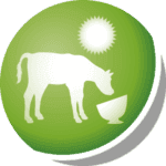 zielone koło z zarysami krowy jedząca z paśnika i świecącym słońcem